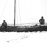 On the way home from Bjuröklubb, Sweden. “One year we came sailing with such a heavy load of seals onboard that the bottom-most of the three planks was totally submerged and the stem was only some twenty centimetres above the waterline. That was, of course, dangerous in open waters. But not one seal was hoisted overboard – we took turns emptying the boat from water and keeping it afloat. We then finally reached the fast ice and managed to get ashore at Tankar.”  Photographer: Erik Bengs 1959 Archive collection: Kvarken Boat Museum